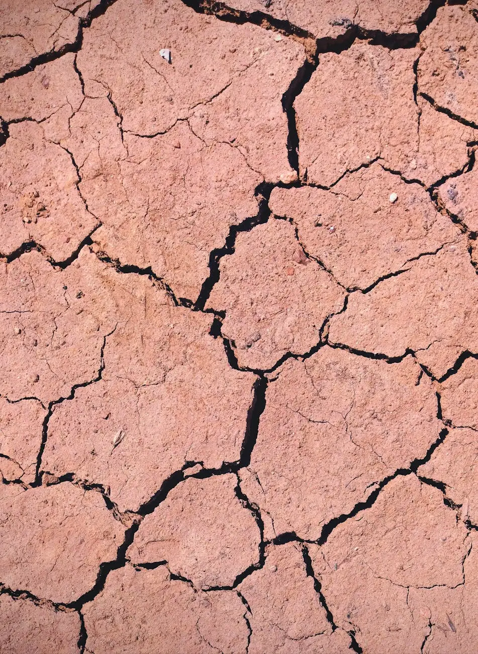 a cracked and dry dirt surface with cracks